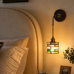 Bild in Gallery-Viewer laden, Colorful glass wall sconce beside a bed