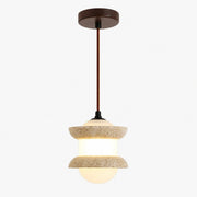 Single travertine stone pendant light on a plain background