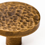 Bild in Gallery-Viewer laden, Close view of the hammered Antique Brass flat round knob face and edge
