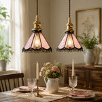 Bild in Gallery-Viewer laden, Pair of pink stained glass pendants above a dining table