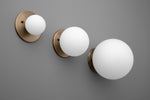Load image into Gallery viewer, Glorica Glass Brass Wall Sconce - Frosted Globe Classic Light For Warm Ambiance
