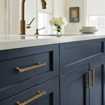 Cargar imagen en el visor de la Galería, Antique brass pulls installed on blue kitchen cabinetry