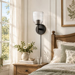 Bild in Gallery-Viewer laden, Black ribbed-glass sconce in a bright bedroom