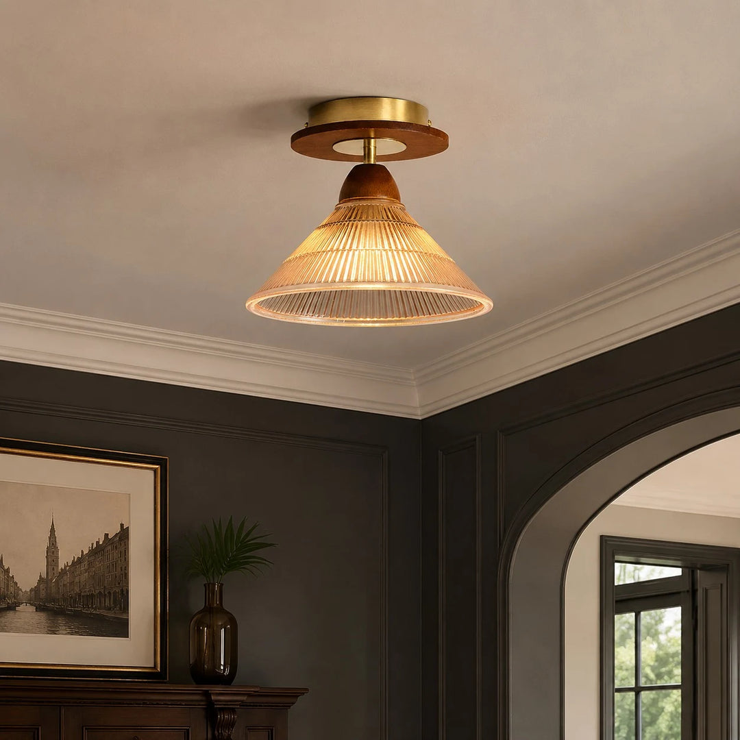 Vintage pleated ceiling light in a moody hallway interior
