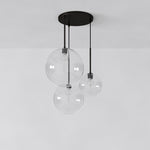 Cargar imagen en el visor de la Galería, Lámpara de araña minimalista de cristal Selvion: luminaria escultural de vidrio artesanal
