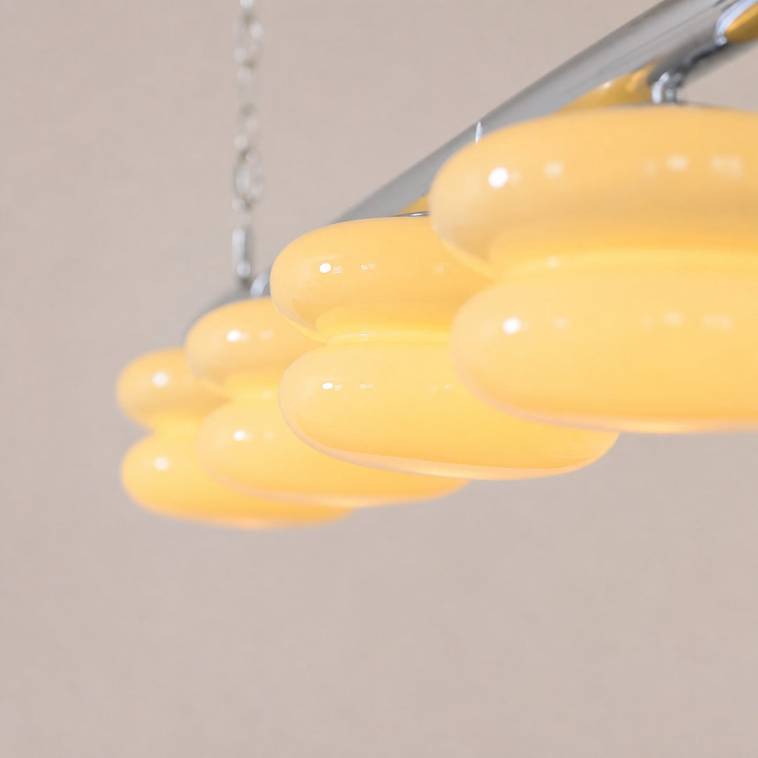 Polished metal rail and hanging chain detail