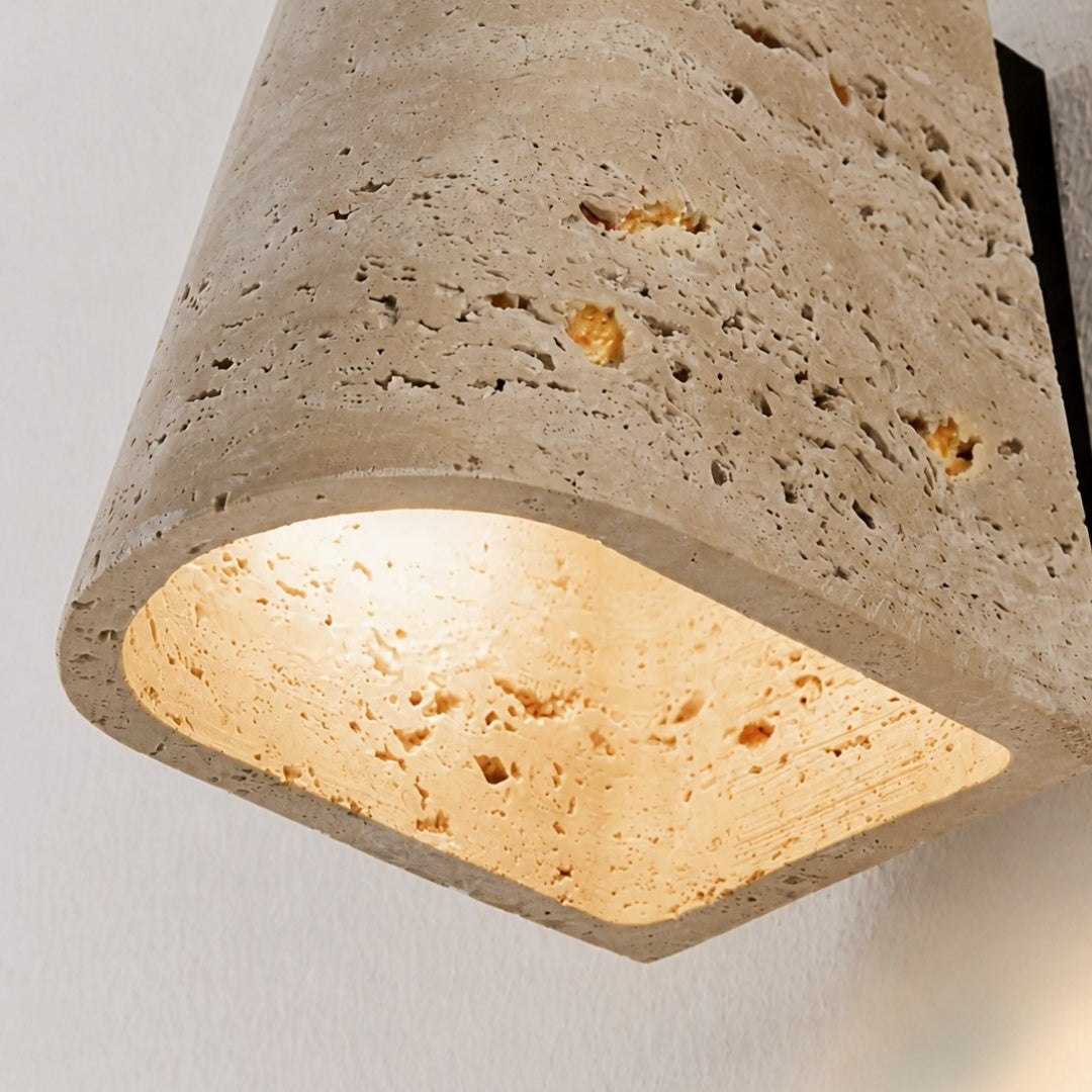 Lower opening and softly illuminated travertine edge