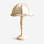 Bild in Gallery-Viewer laden, Cream fabric shade wood table lamp on white background