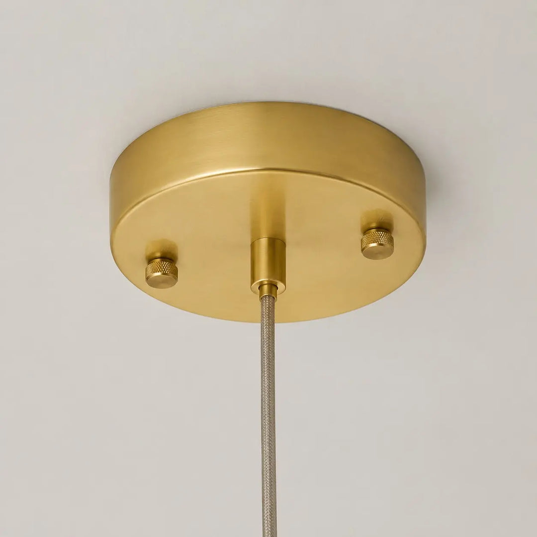 Close-up of brass-toned ceiling canopy