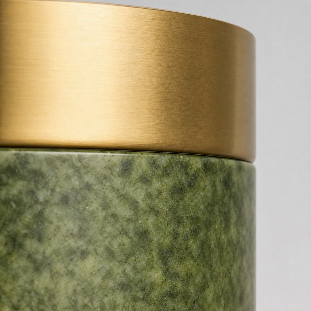 Side view of green jade stone and metal finish