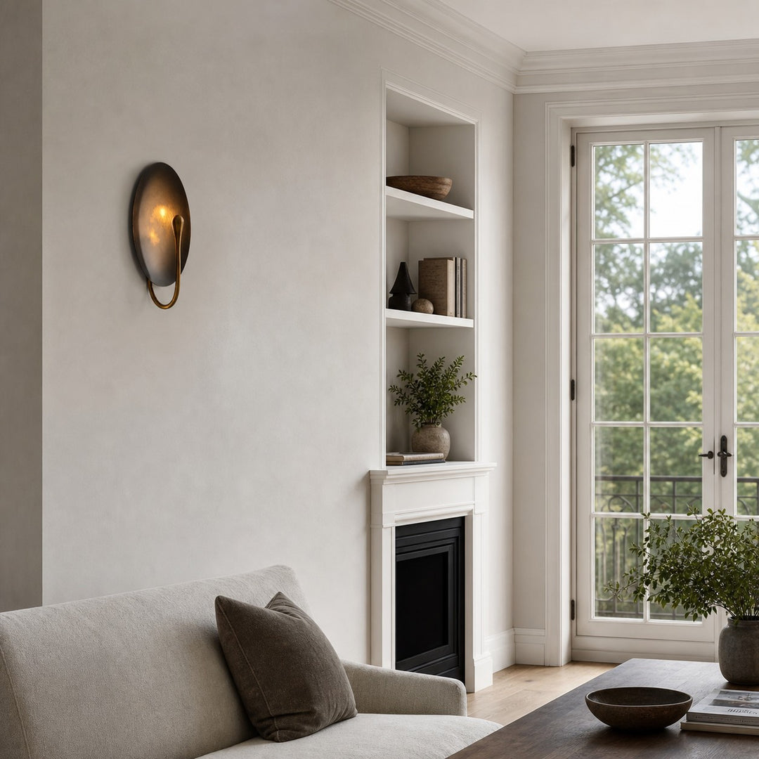 Sculptural wall sconce in a bright living room