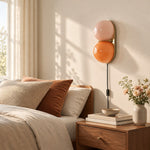 Charger l'image dans la visionneuse de galerie, Two globe glass wall sconce beside a sofa