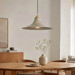 Load image into Gallery viewer, Aged brass pendant lamp over a warm dining table