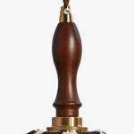 Charger l'image dans la visionneuse de galerie, Close-up of dark wood handle, twisted cord and brass connector on the pendant lamp