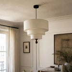 Bild in Gallery-Viewer laden, White fabric pendant light above a dining table