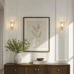 Bild in Gallery-Viewer laden, Clear glass wall sconce shown beside framed wall art