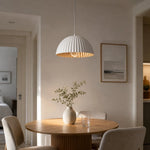 Load image into Gallery viewer, White metal pendant lamp over a round dining table