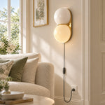 Charger l'image dans la visionneuse de galerie, White glass wall sconce beside a chair