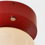 Load image into Gallery viewer, Angled close-up of red ceiling plate and brushed metal accent