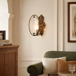 Load image into Gallery viewer, Antique brass textured glass wall sconce installed in a living room