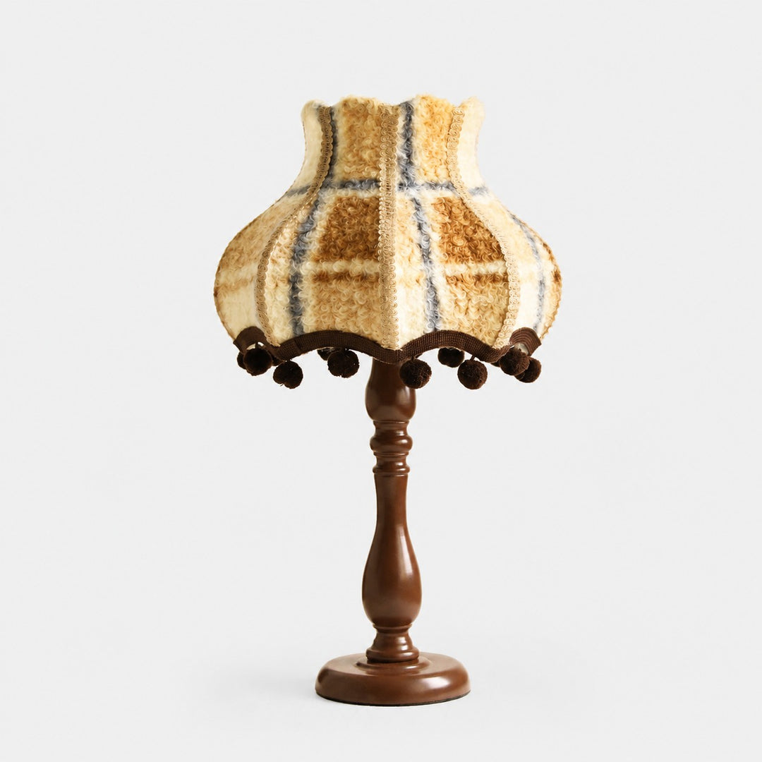 Vintage warm blue plaid fabric table lamp on white background