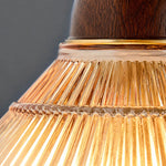 Charger l'image dans la visionneuse de galerie, Close view of amber pleated shade and wood tone collar