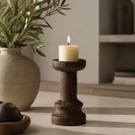 Load image into Gallery viewer, Solid wood candle holder in a calm sunlit tabletop setting; candle not included