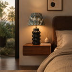 Load image into Gallery viewer, Sculptural ceramic table lamp on a bedroom nightstand
