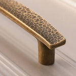 Cargar imagen en el visor de la Galería, Hammered brass cabinet pull surface texture
