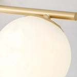 Load image into Gallery viewer, Gold metal bar and milk glass shade detail