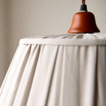 Load image into Gallery viewer, Upper shade detail with terracotta-tone cap and fabric folds