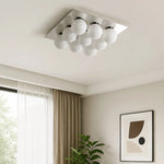 Cargar imagen en el visor de la Galería, Gallery image: living room installation scene with plant and wall art.