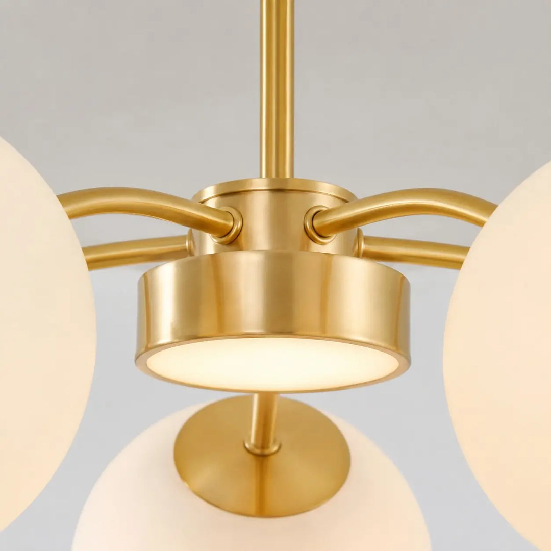 Gold metal chandelier central body detail