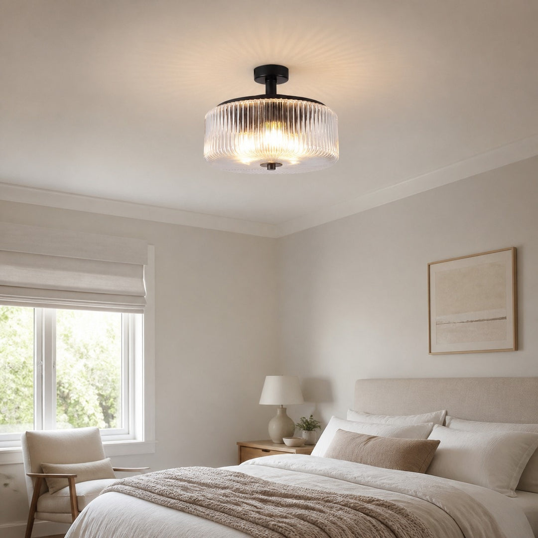 Ribbed glass flush mount ceiling lamp in a bedroom