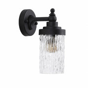Black metal wall sconce with ribbed clear glass shade