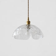 Single clear pressed-glass flower pendant with brass socket