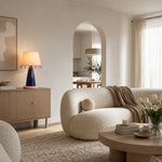 Load image into Gallery viewer, Sculptural ceramic table lamp on a sideboard in a neutral living room