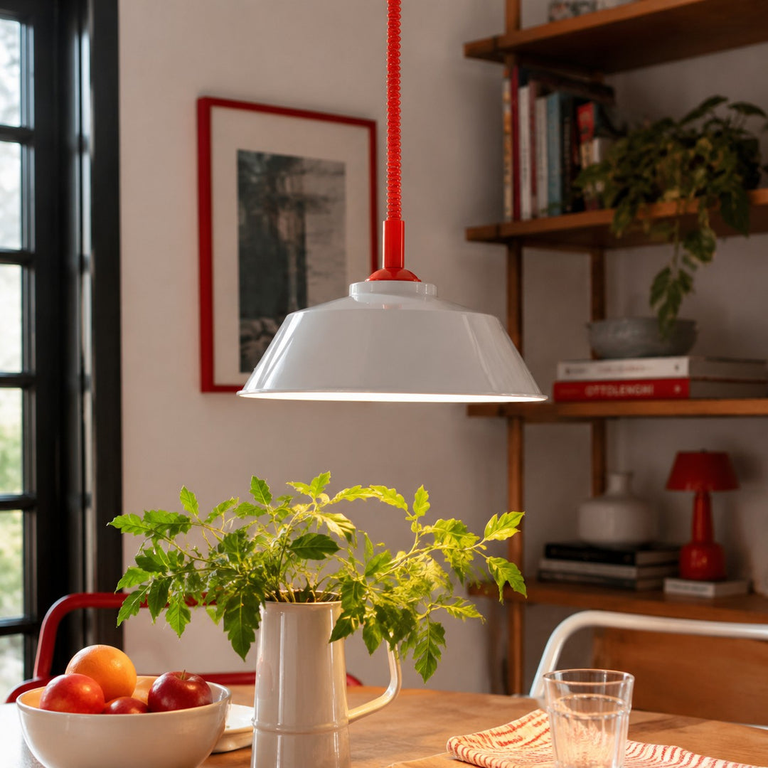 Memphis pull-down pendant in a dining space