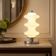 White opal glass table lamp on foyer console