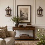 Charger l'image dans la visionneuse de galerie, Rustic wall sconces beside framed wall art and a console table