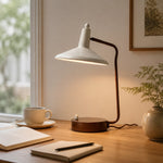 Bild in Gallery-Viewer laden, Ivory and brown desk lamp illuminating an open book by a window