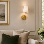 Cargar imagen en el visor de la Galería, Decorative brass wall lamp in a refined living space
