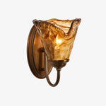 Bild in Gallery-Viewer laden, Sculpted Amber Glass and Brass Wall Sconce