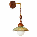 Charger l'image dans la visionneuse de galerie, Side view of the Japanese wabi sabi wall sconce with round wooden backplate and brass wall arm