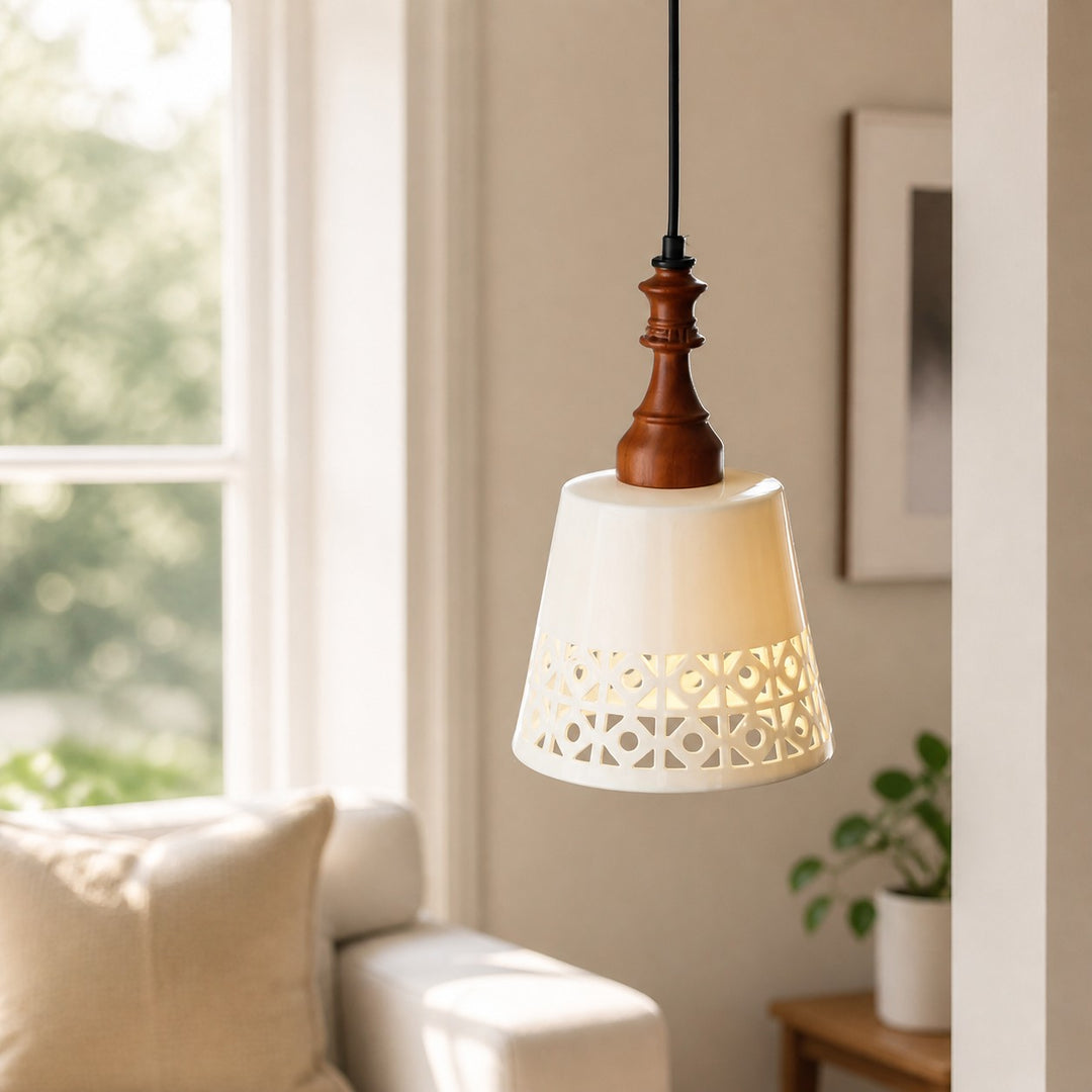 cream ceramic cutout pendant light in a bright living room