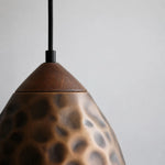 Bild in Gallery-Viewer laden, Close view of hammered antique copper pendant shade texture