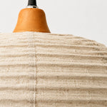 Load image into Gallery viewer, Close view of the fabric shade and wooden top detail