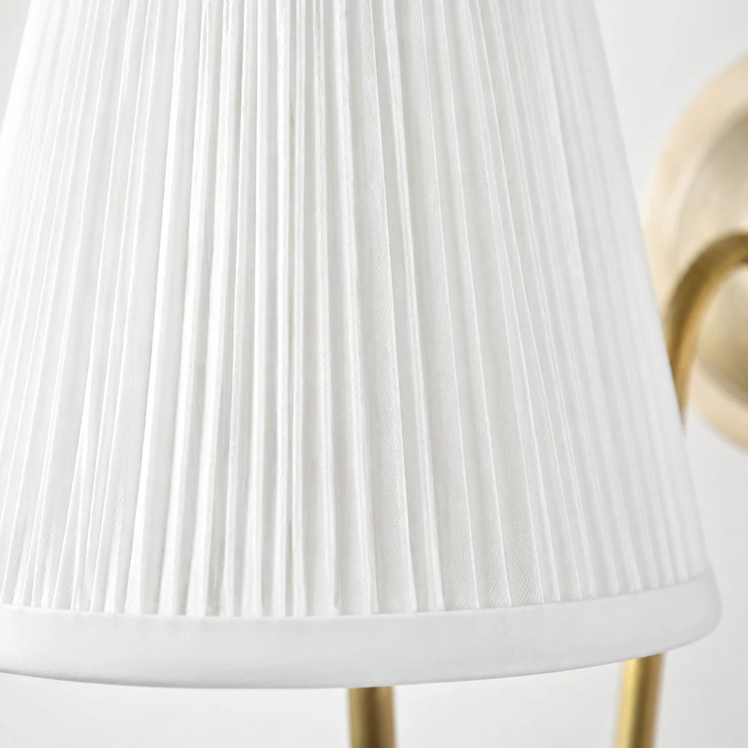 Close-up of the white pleated fabric shade