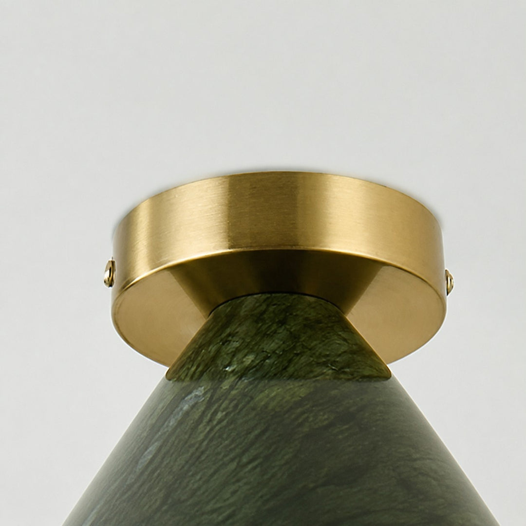 Close-up of ceiling canopy connection and jade-style shade texture