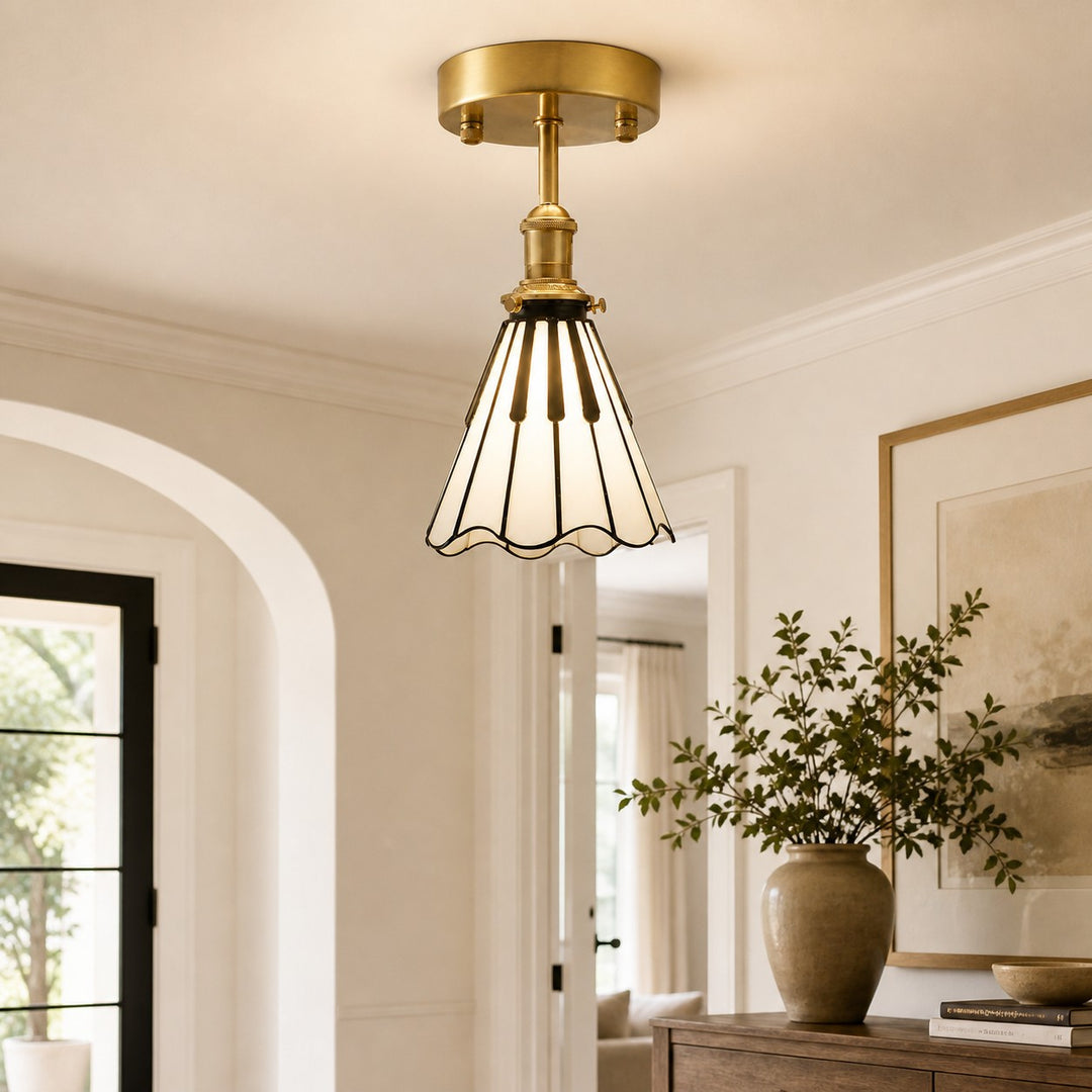 Piano key ceiling light installed near an interior archway